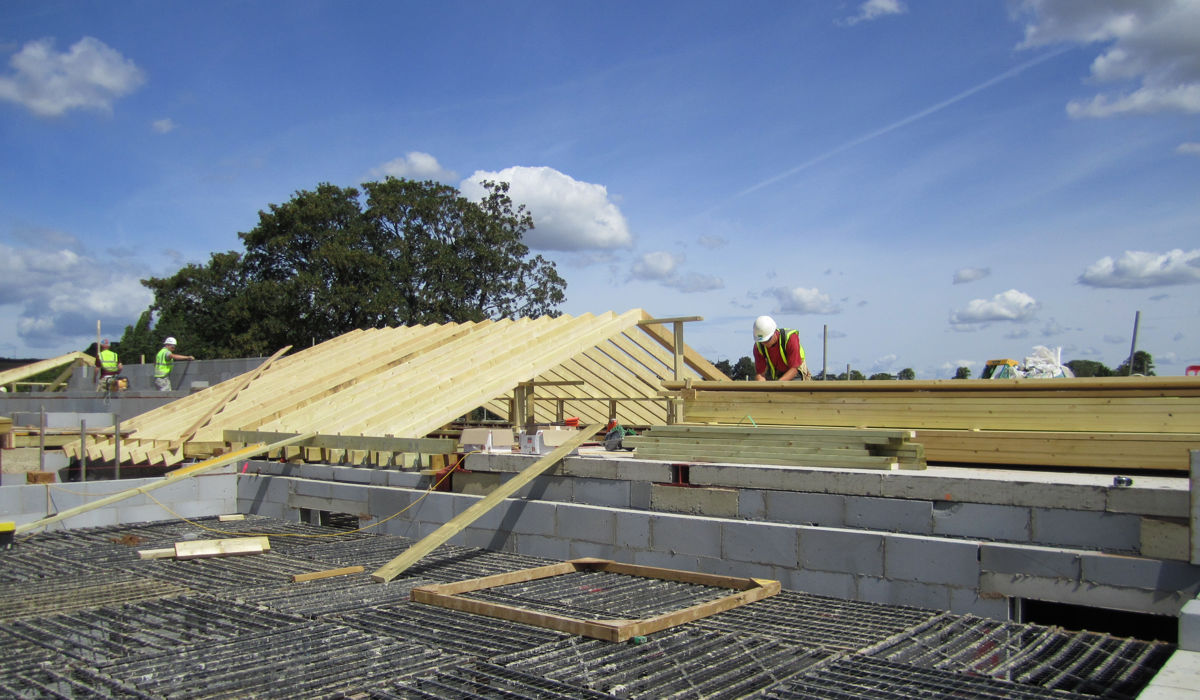 Self-build homes - roof timbers being laid